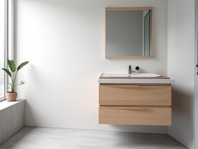 Sleek modern bathroom vanity with minimalist design in sustainable ash wood